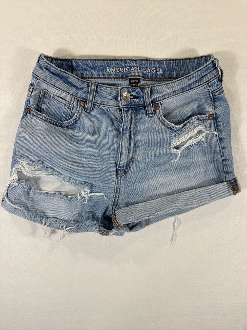 American Eagle Outfitters Light Blue Ripped Denim Roll-Hem Shorts